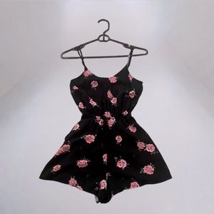 Black One-Piece Romper With Pink Roses.